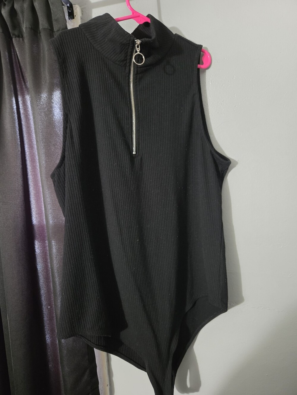 Jennifer Lopez Zippered Black Bodysuit